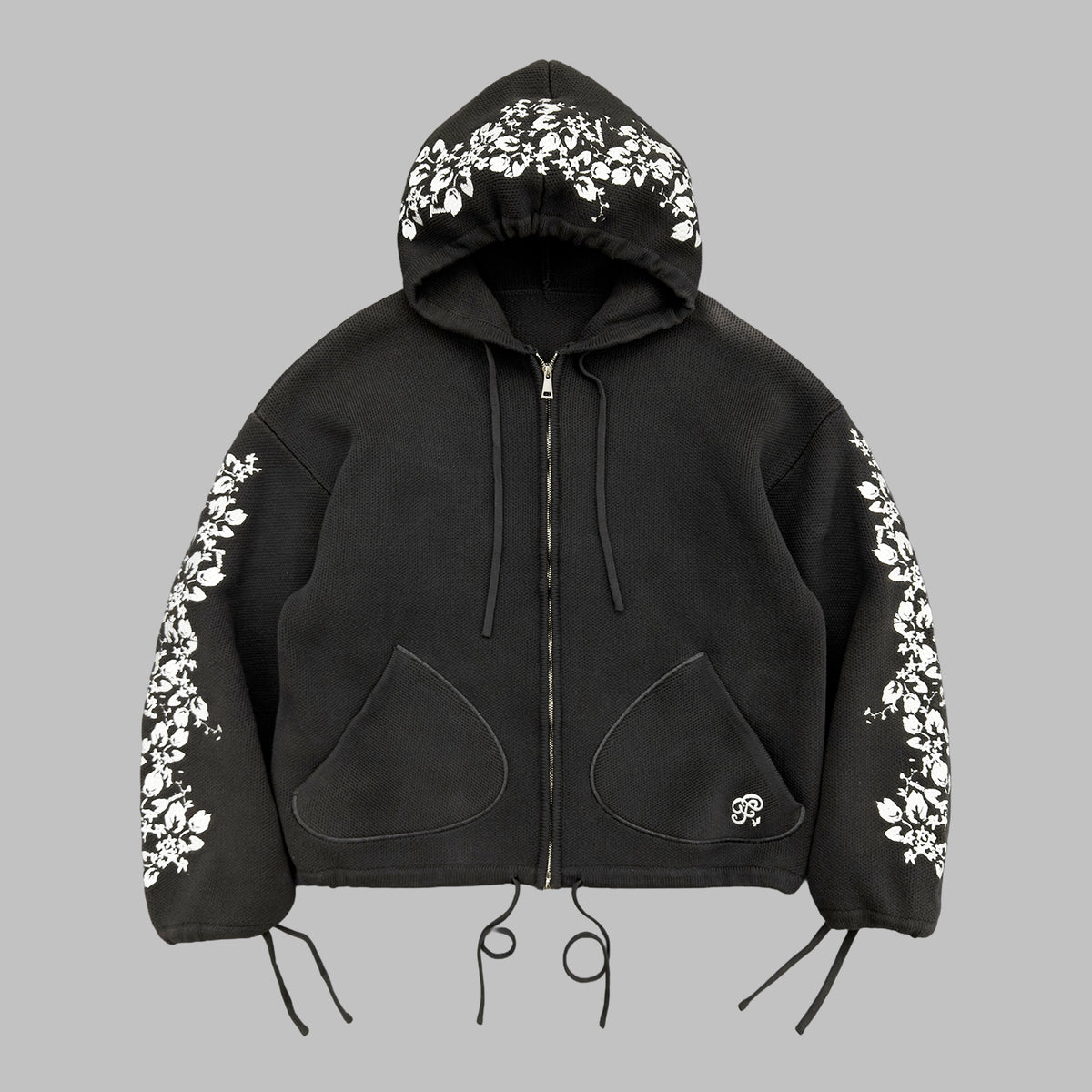 La veste tricot de la chambre noire
