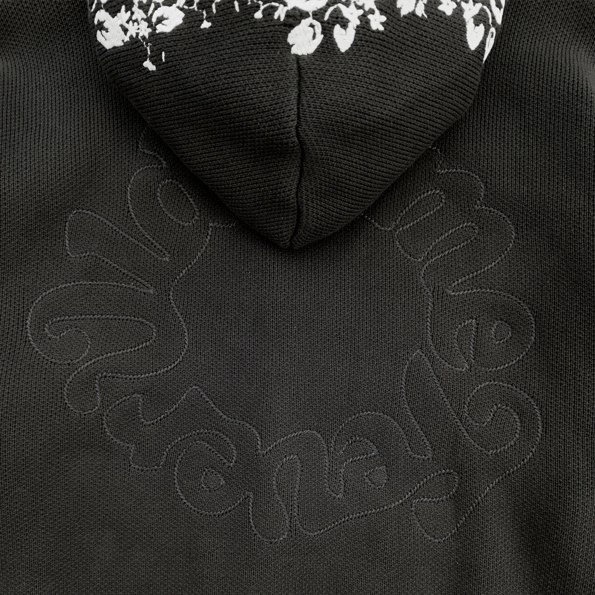 La veste tricot de la chambre noire