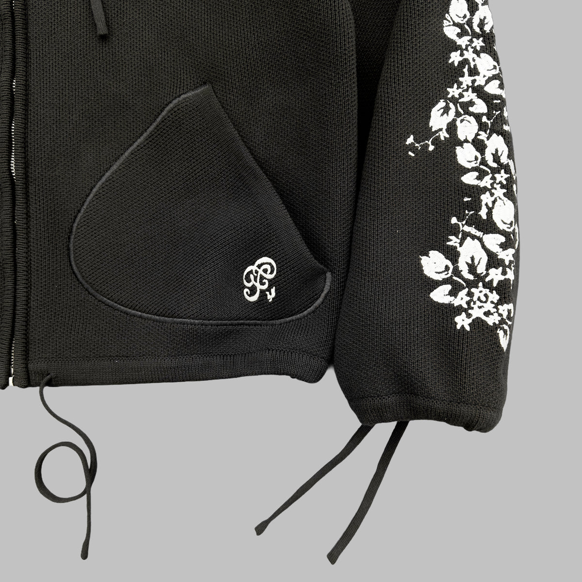 La veste tricot de la chambre noire